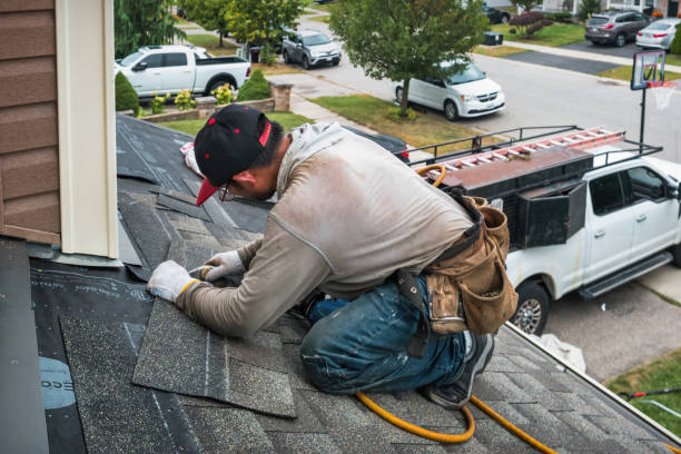 Professional Roofing technician working in Lotus, CA